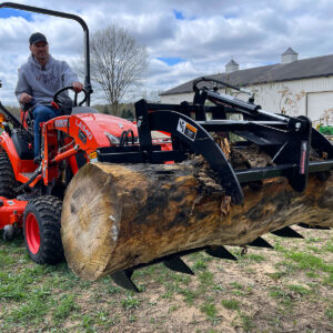 Mini Hydraulic Grapple (SCG-48) for Subcompact Tractors by Worksaver on Kubota BX23s