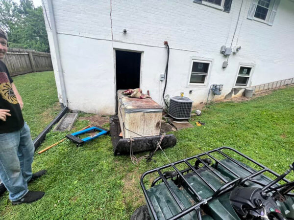 Yard Glider Removing Chest Freezer From Basement