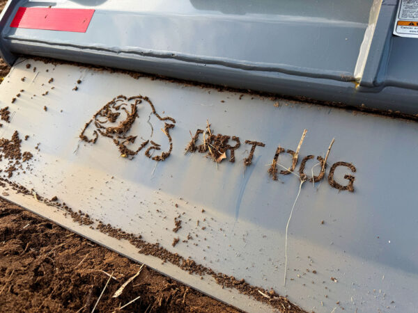 Dirt Dog Logo Packed with Freshly Tilled Soil