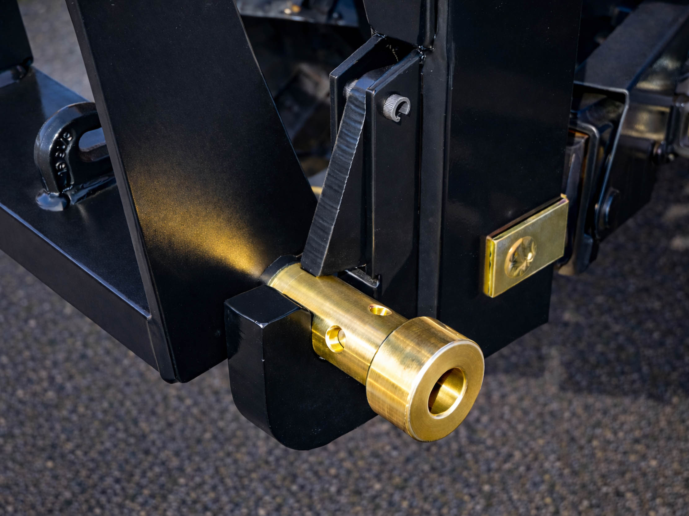Brass Bushings in Lower Hook of Quick Hitch