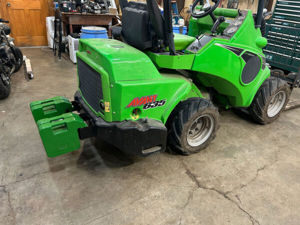 70 lb Suitcase Weights on an Avant Wheel Loader