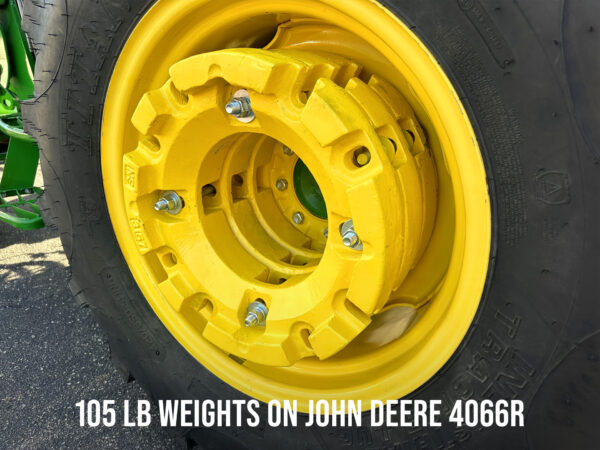 Triple Stack 105 lb Wheel Weights on John Deere 4066R Close Up