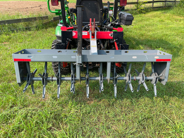 Rear View of Plug Aerator on John Deere 1025R