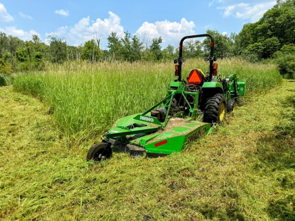 Brush hog mounted on a tractor