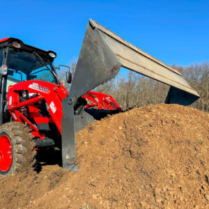 4-N-1 Bucket In Open Position About To Scoop Dirt Pile