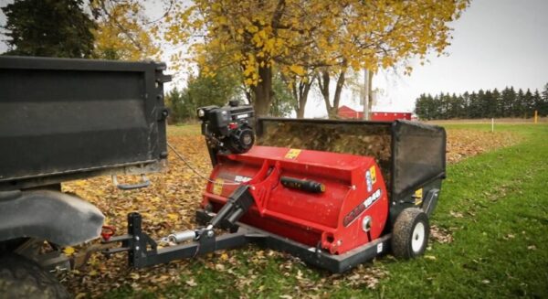 Pick up leaves, sticks, pinecones, and other debris with a pull behind lawn sweeper by MK Martin
