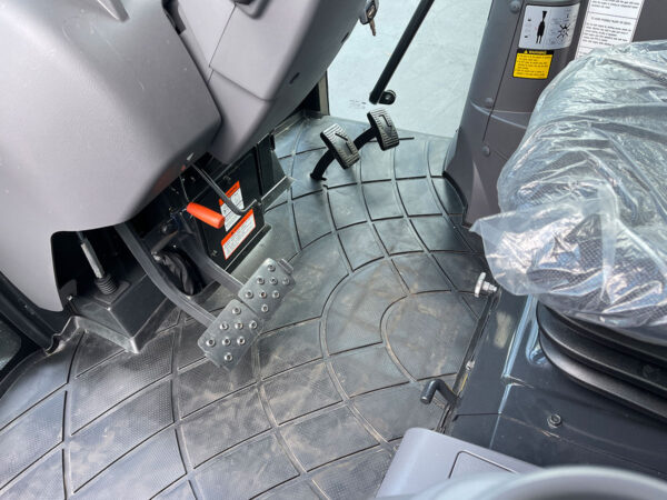 RENTAL Kioti NS6010 Utility Tractor Interior Floor