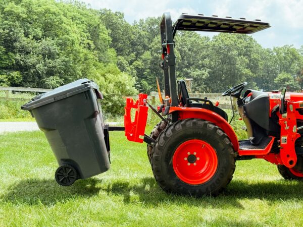 Side View of Tractor with Two Trash Cans on Double Trash Can Hauler