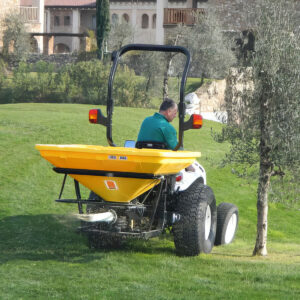 BEFCO 3-Point Pendulum Spreader on Lawn