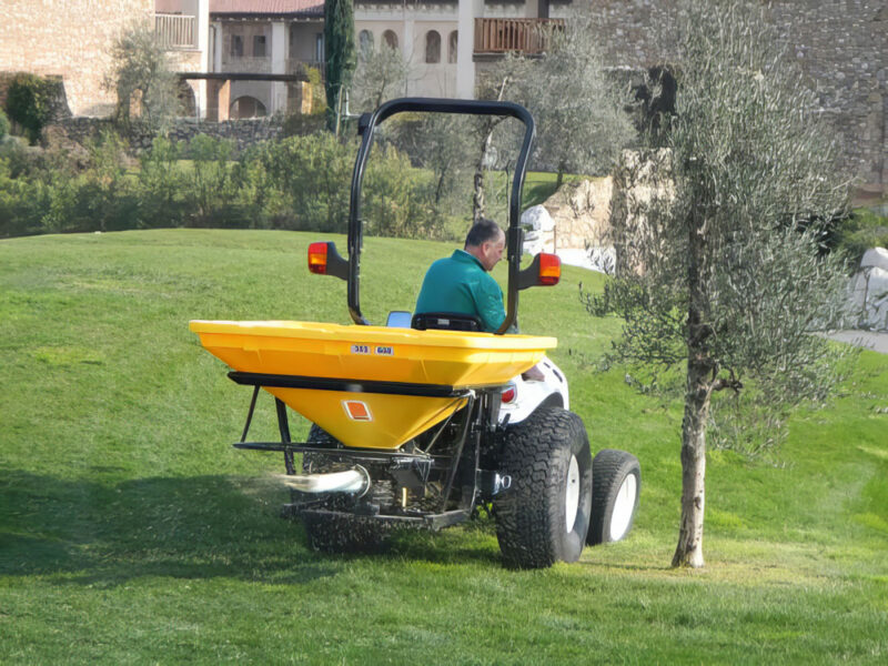 BEFCO 3-Point Pendulum Spreader on Lawn