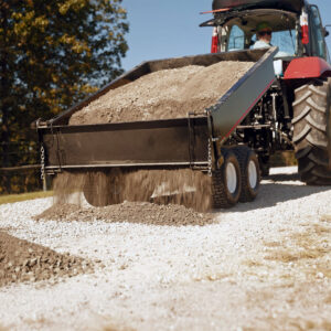 Spreading Gravel with the Tailgate Open At Bottom