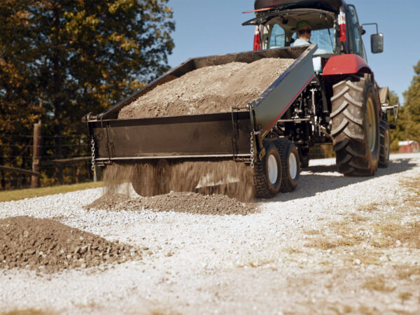 Spreading Gravel with the Tailgate Open At Bottom