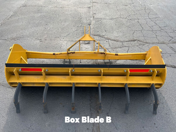 Rear View of Used Rollover Box Blade B (Bent Axle, Missing Handle)