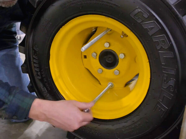 Sliding the bolts through the rim