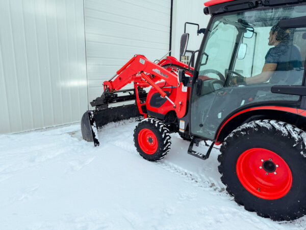 Backdragging snow away from wall with GWT VersaPusher