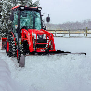 GWT VersaPusher pushing snow