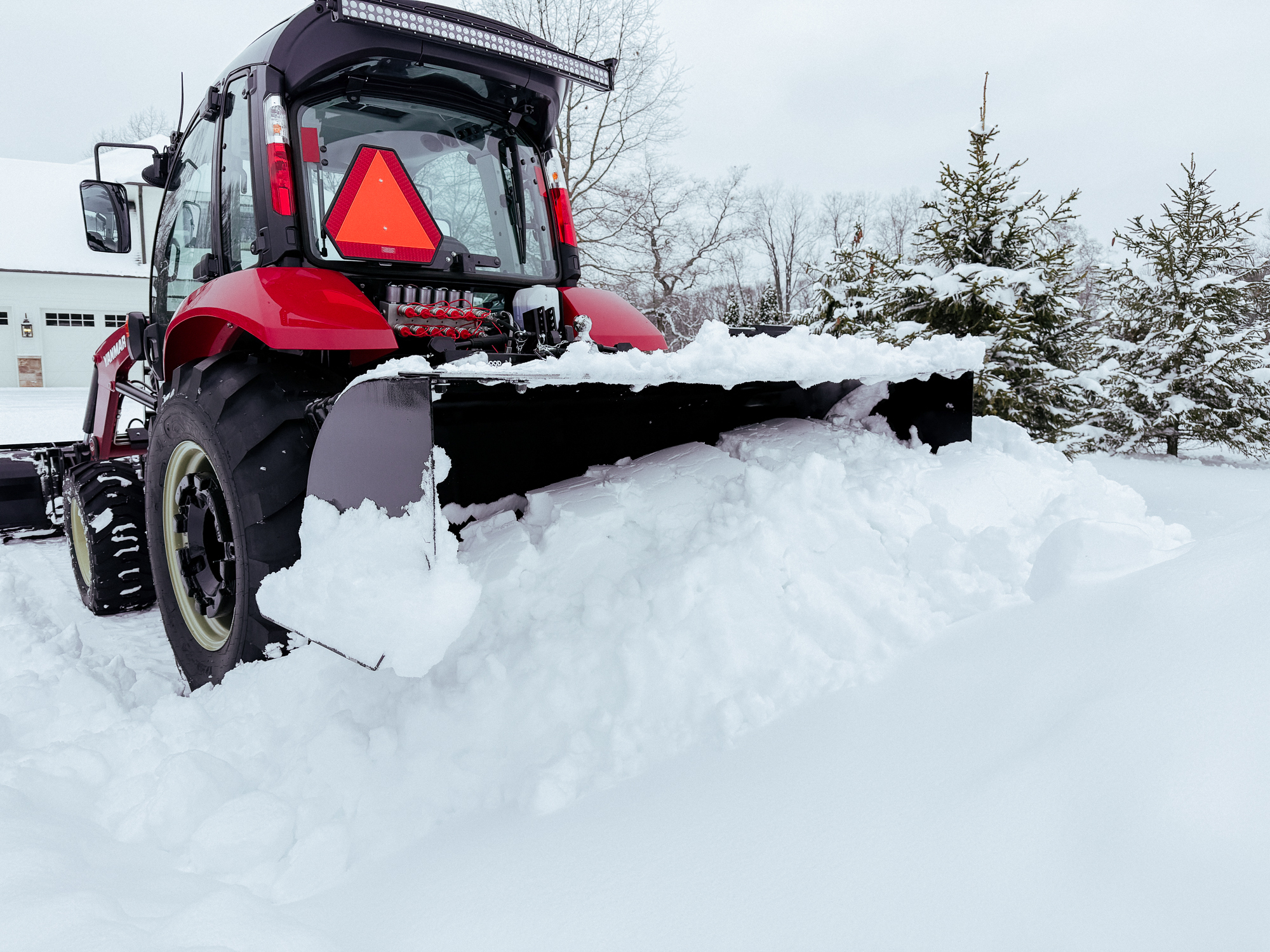 Piling snow with the VersaPusher on the 3-Point